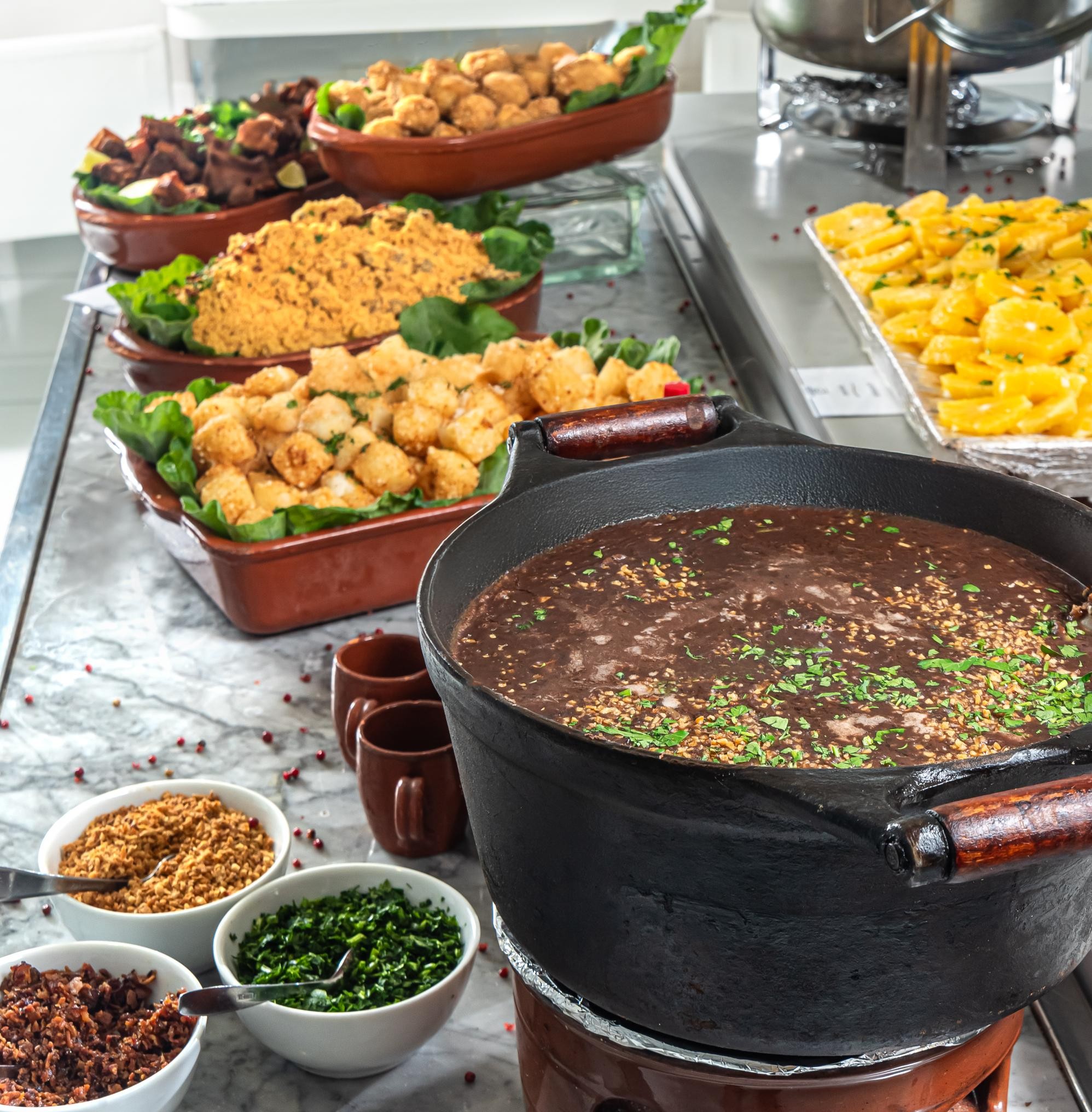 Celebração de São Jorge: descubra os melhores lugares para saborear a feijoada tradicional